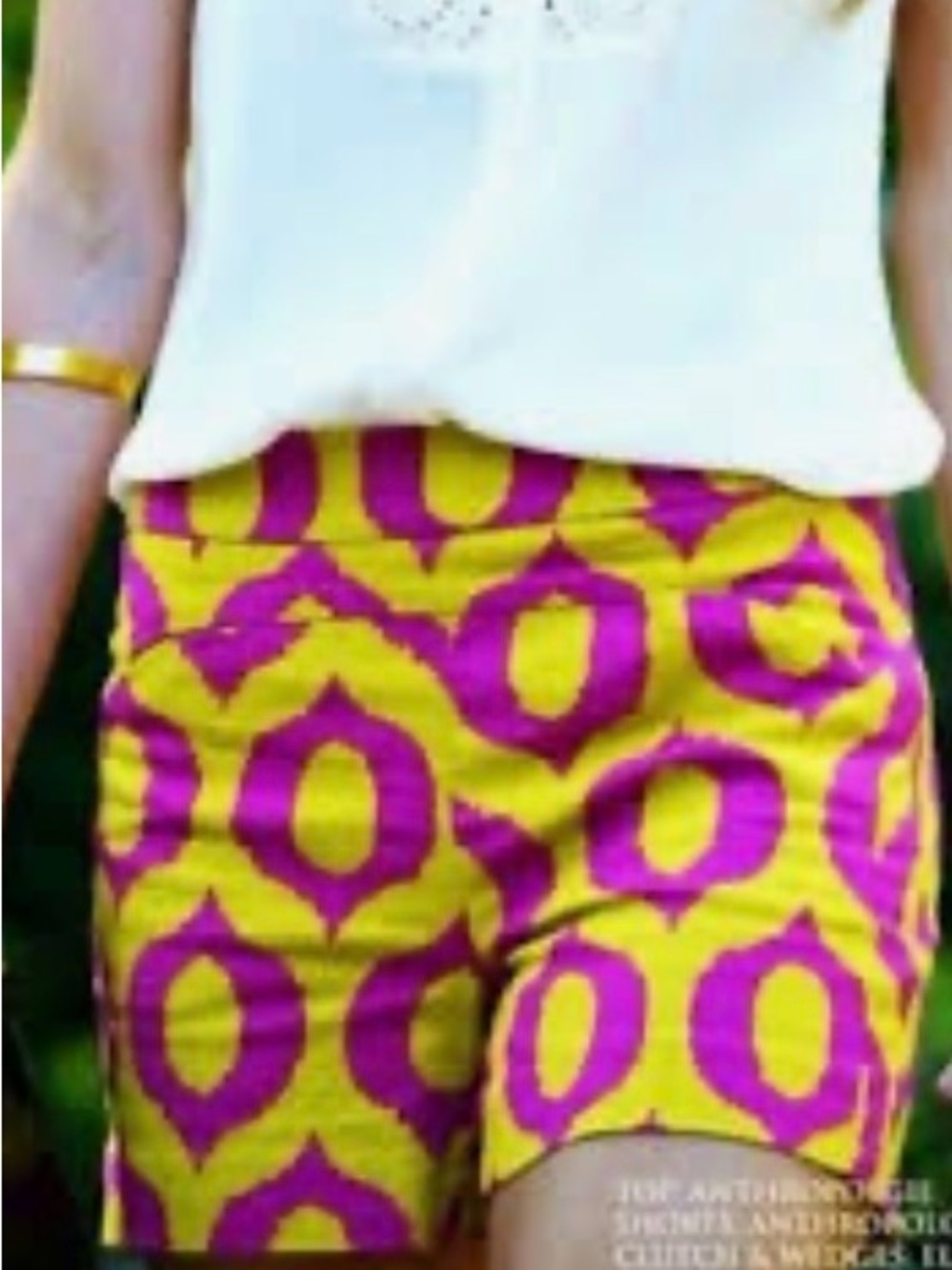 Anthropologie's Cartonnier with distinctive yellow & magenta geometric pattern.